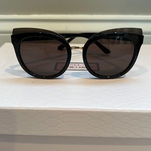 Tory Burch black sunglasses.